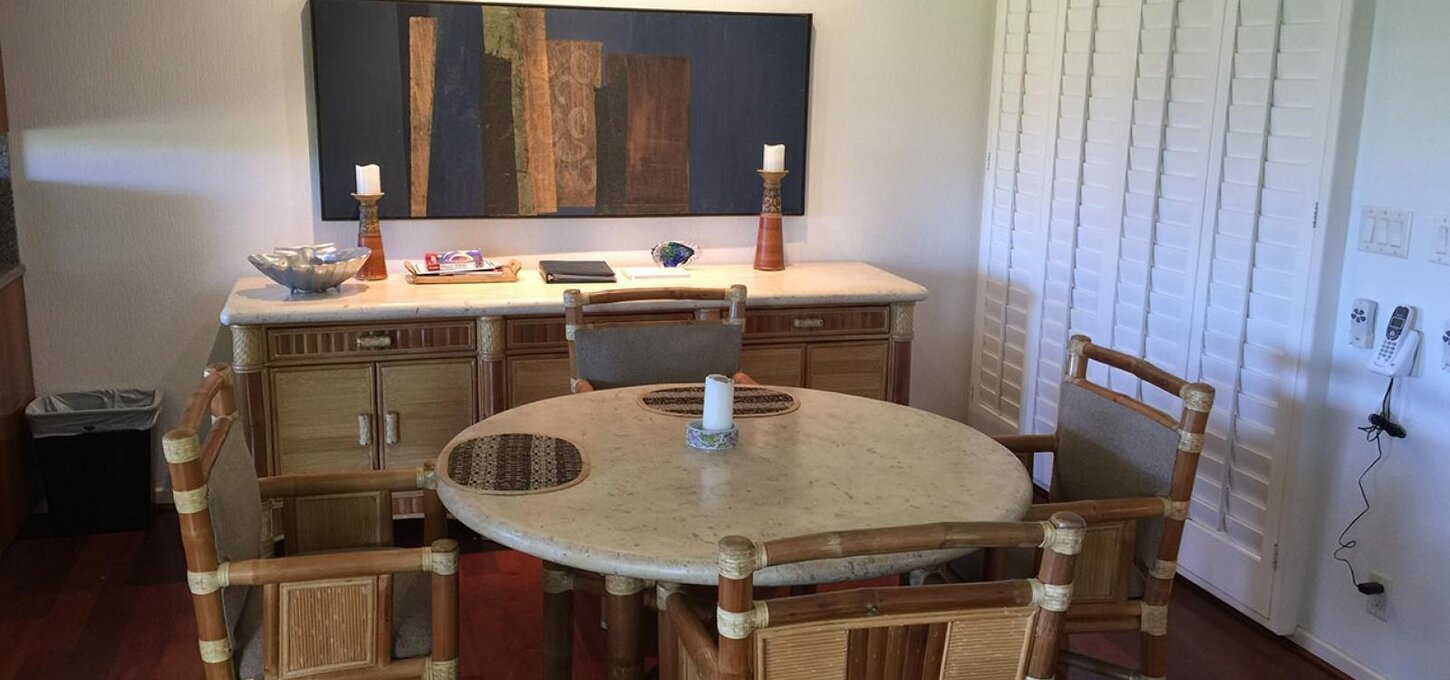 Indoor dining table and original art by my mother